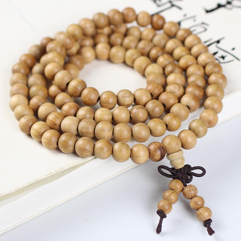 Браслет з буддійських намистин персикового дерева: 108 намистин Культурний та мистецький аксесуар