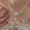Real gold electroplated pearl and diamond-inlaid floral necklace, niche, fashionable, versatile collarbone chain, elegant and high-end accessory