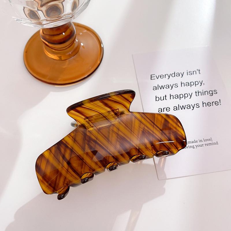 Stilvoller gestreifter Haarklammer-Clip aus Acetat für mühelose und schicke Frisuren für Frauen