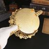 A metal fruit basket with handle, European style large food, snacks, candy storage tray, exquisite craft tableware.