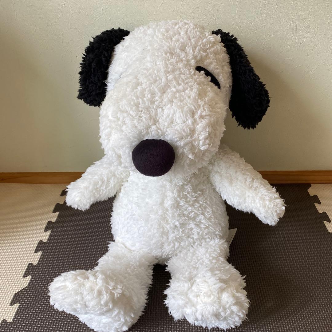 Snoopy stuffed animal with polka dot collar