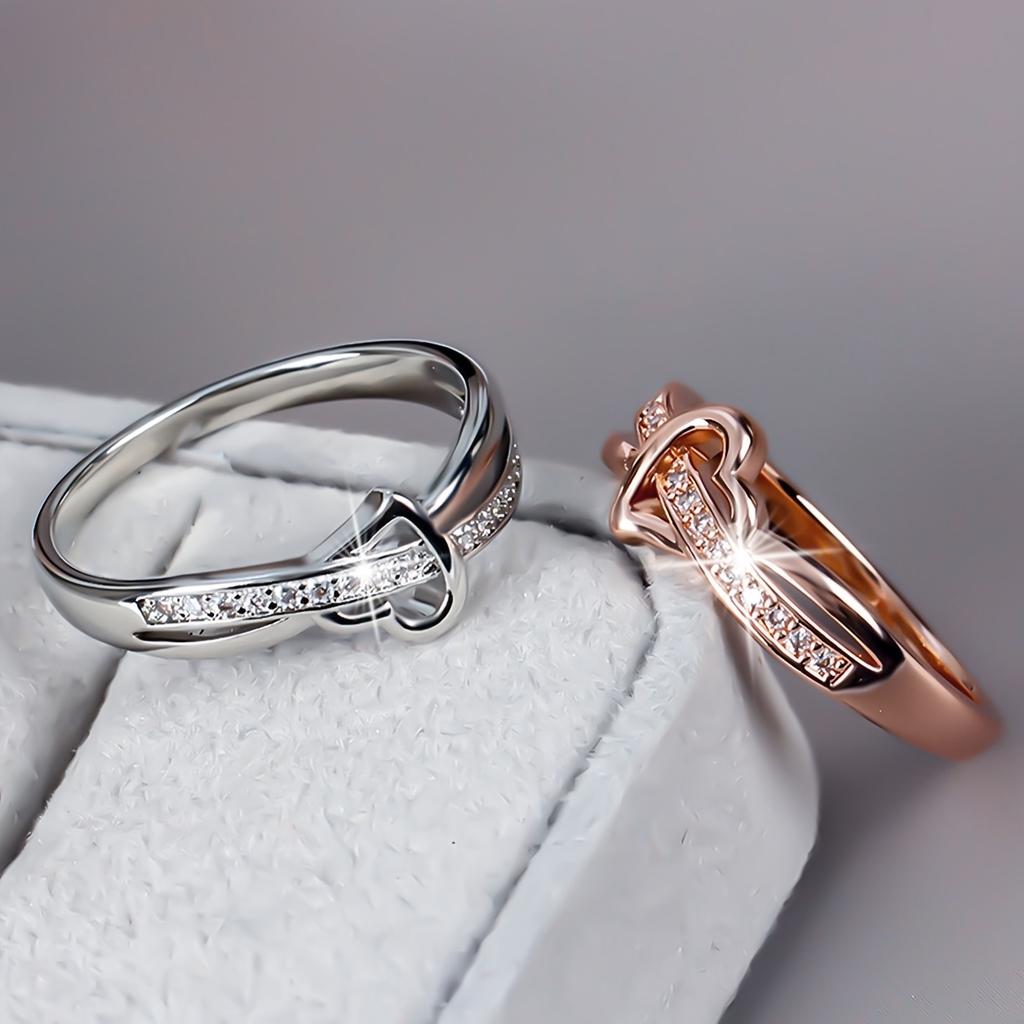 1A delicate, fashionable, romantic, and elegant heart-shaped ring with intricate interlaced hollow design, suitable as a gift for Valentine's Day,