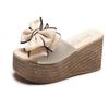 Slope heel sandals women's summer new bow one-word cool slippers women wear high-heeled beach slippers