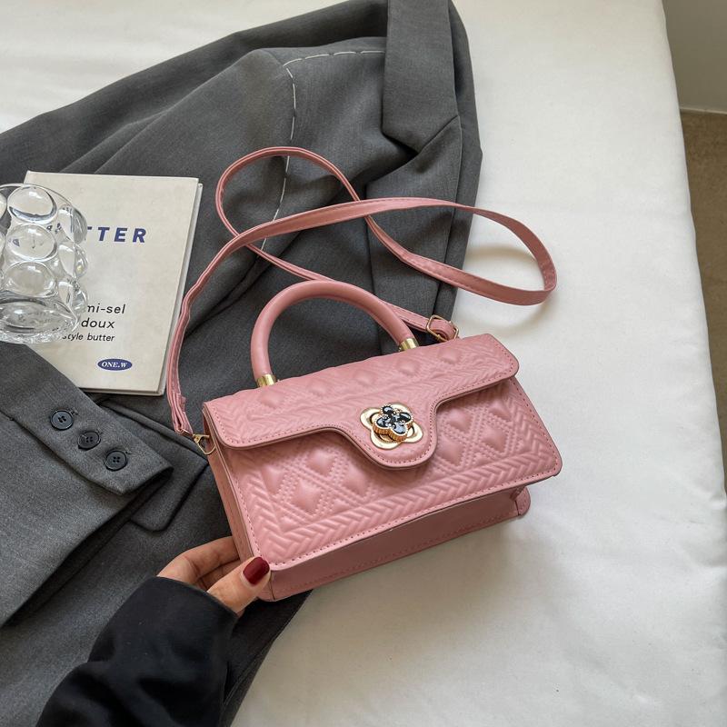 

Женская сумка 2025 года с замком в иностранном стиле, новая женская сумочка с ромбовидной текстурой, повседневная сумка через плечо в иностранном стиле розовый