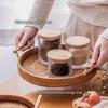 Handgewebtes Rattan-Aufbewahrungstablett mit Holzgriff, runder Weidenkorb, Brot-Lebensmittelteller, Obstkuchen, Bestecktablett, Abendessen-Tablett