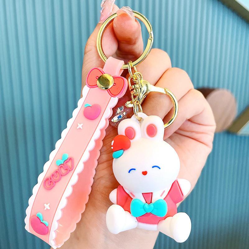 Adorable Cartoon Bunny Keychain Soft Rubber White Rabbit Peach Dressed