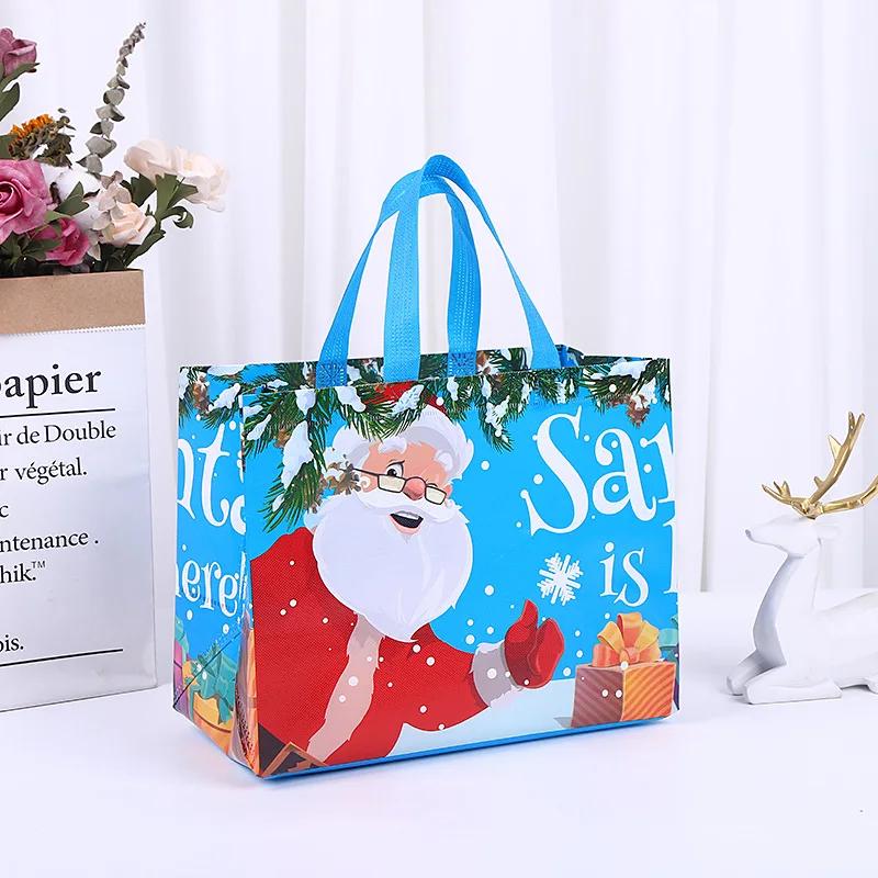 1PC New In Christmas Gift Bags Cartoon Cute Print Santa Elk Snowman Printing Non Woven Foldable Storage Handbag Party Supplies