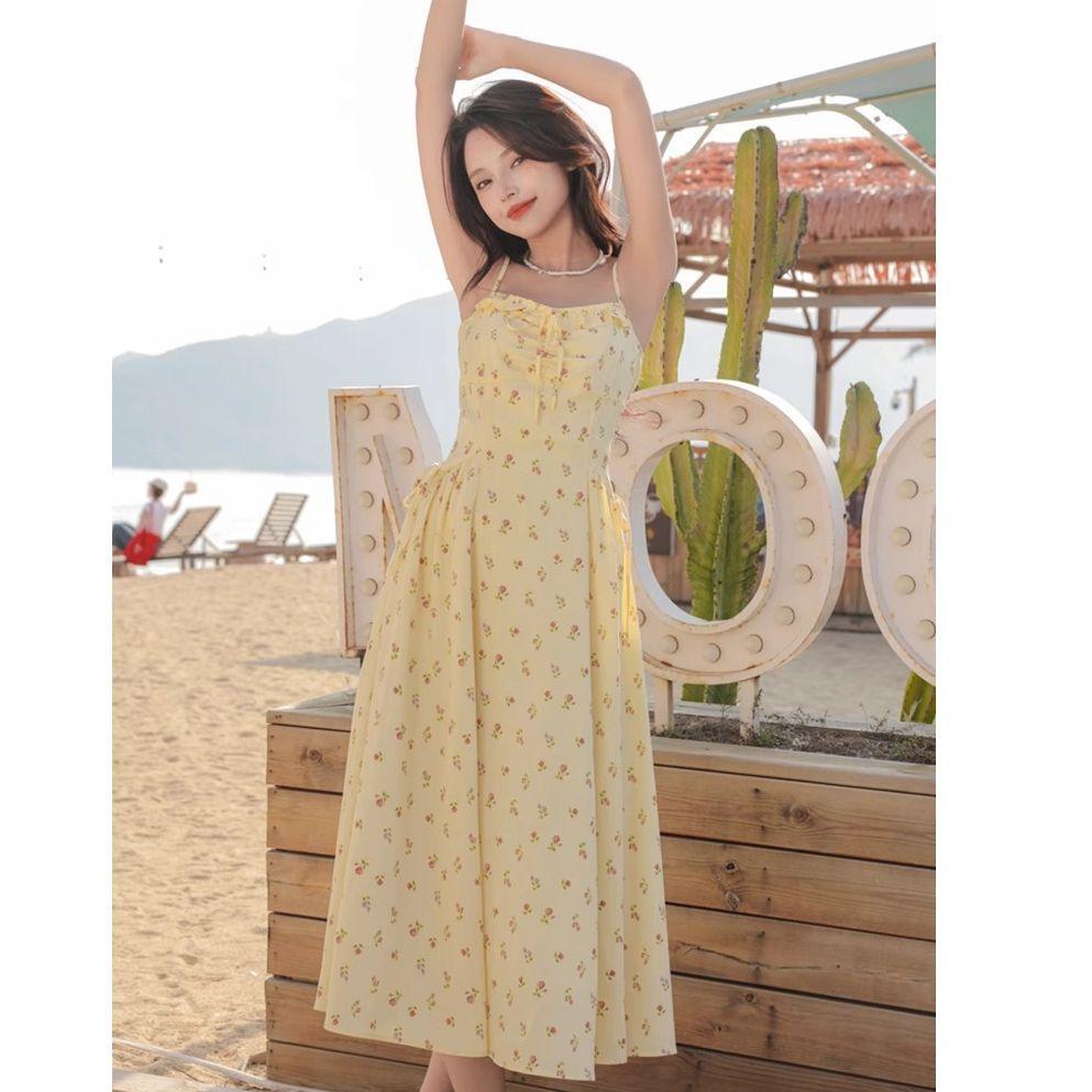 French yellow floral dress small suspender dress women's summer new atmosphere commuter temperament long skirt