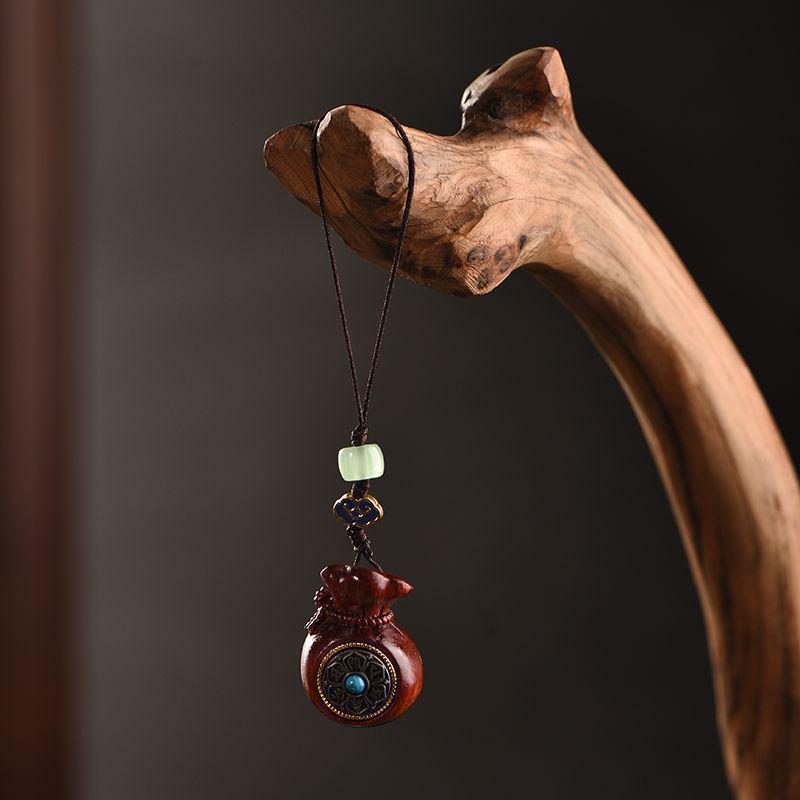 Year of the Dragon Keychain: Green Sandalwood Rotating Coin Pendant & Phone Charm