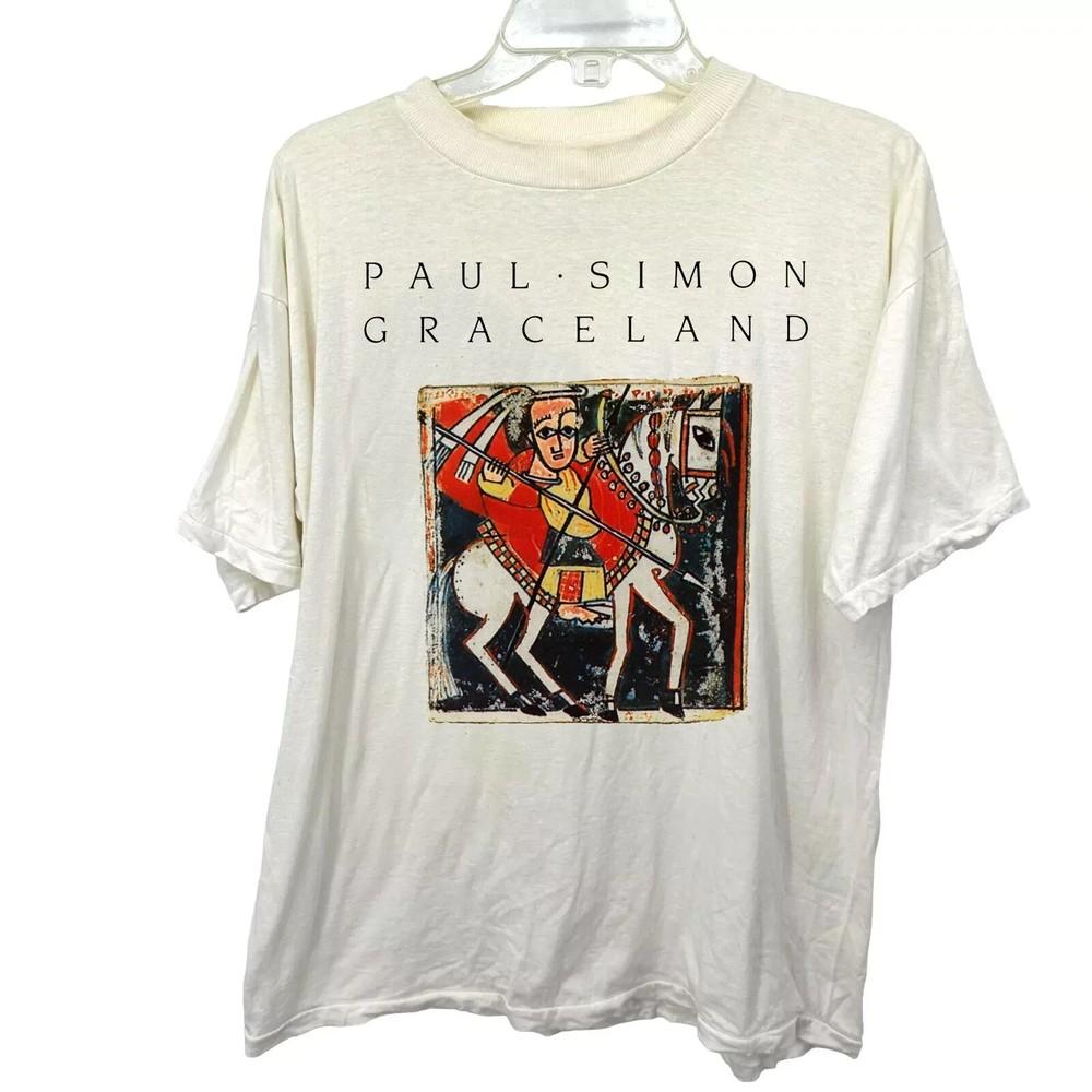 

Paul Simon Graceland UNISEX WHITE COTTON T Shirt Reprint Unisex T-Shirt XXL