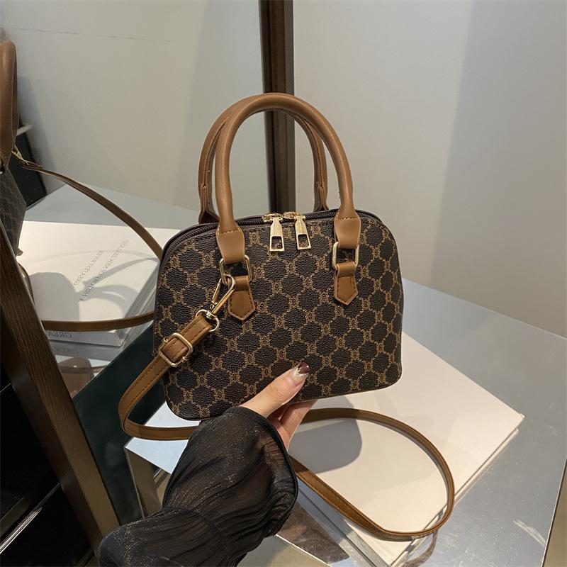 

Повседневная модная простая сумка-ракушка, нишевая дизайнерская сумка, женская, осень 2024 года, новая сумка-мессенджер для поездок на работу, женская сумка через плечо