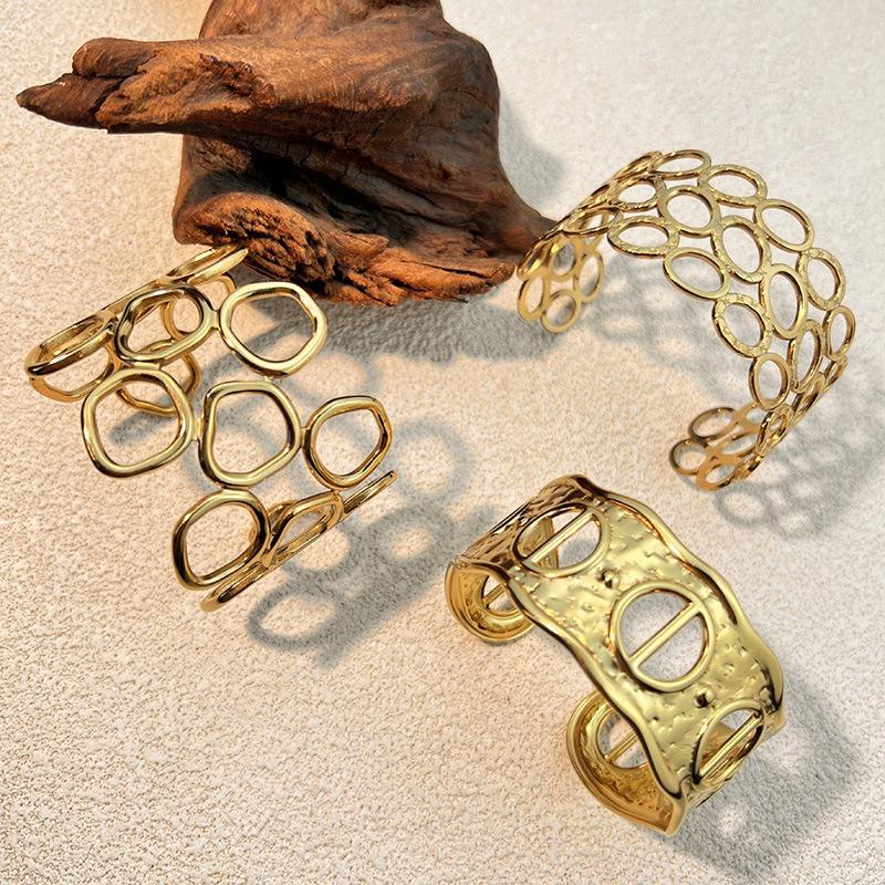European and American Fashion Stainless Steel Hydraulic Bracelet Plated with 18K Gold Opening Design Sense Hollow Titanium Steel Bracelet