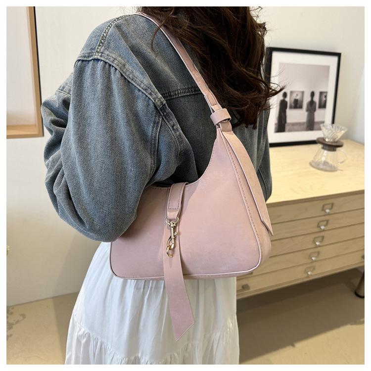 

Niche design high-end underarm bag women s 2025 new fashion texture retro chain shoulder bag tide рожевий