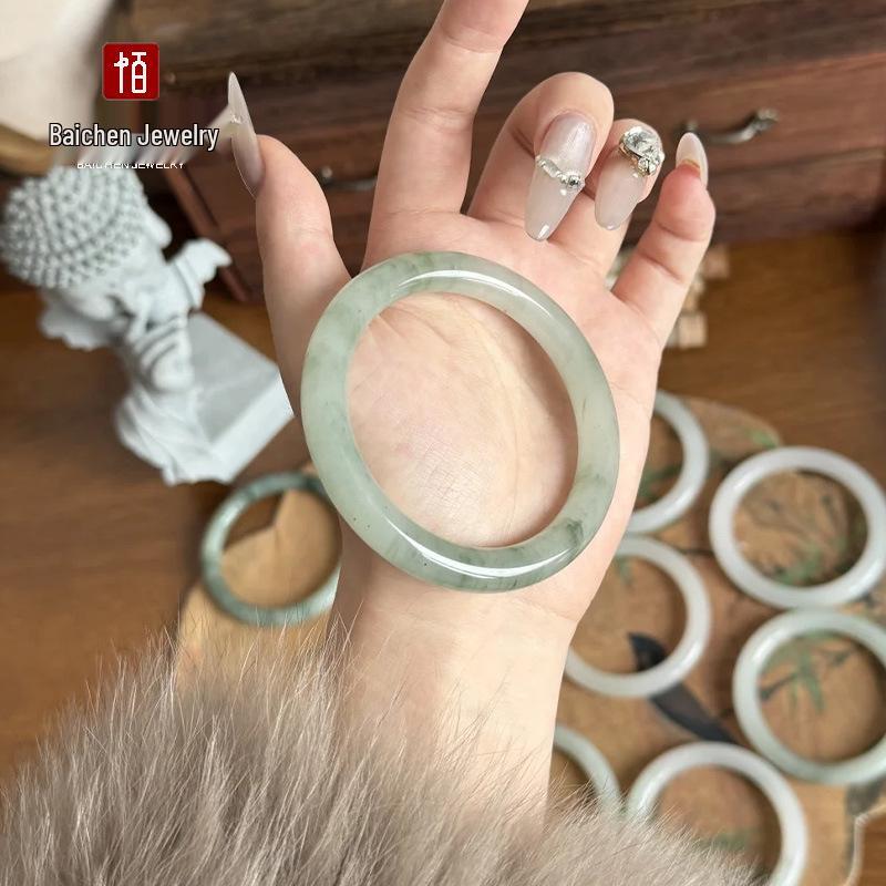 

Golden Silk White Jade Bangle with Jadeite Hue from Xinjiang Tianshan Kunlun Gobi Jade. 54mm