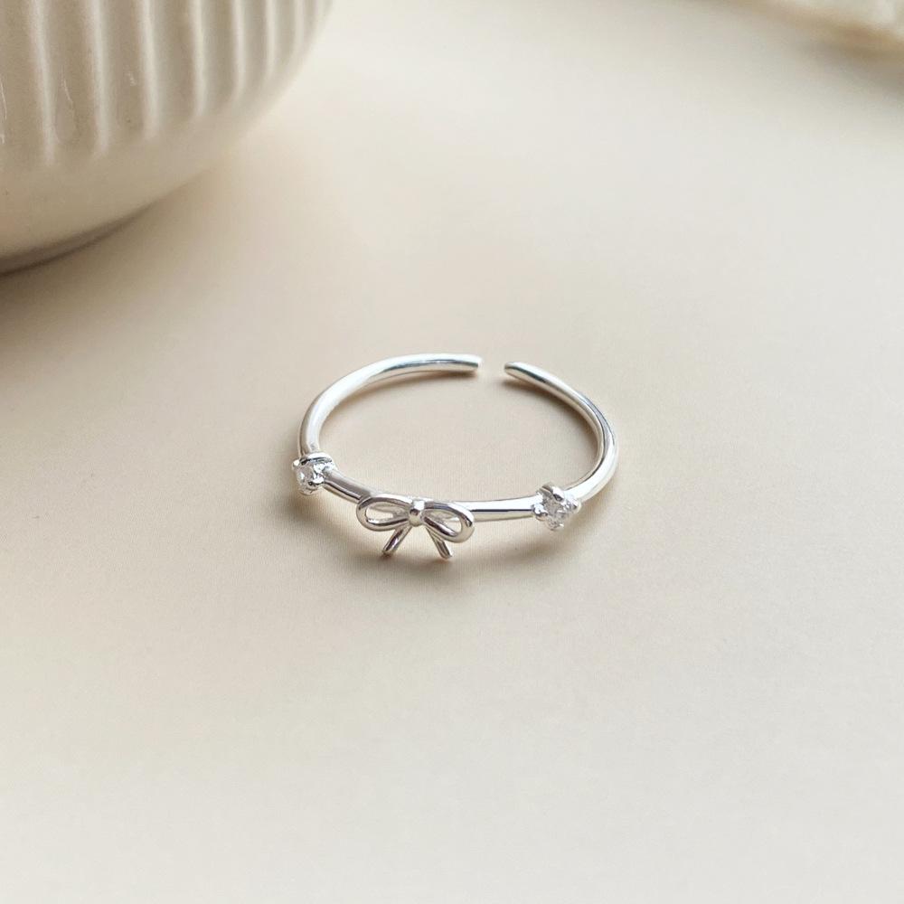 Серебряное кольцо-бант с цирконами S999 для женщин – Элегантное, Нишевый дизайн, Регулируемое, Роскошное ношение. Open Adjustable