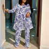 Women Plus Size Two Piece Loungewear Round Neck Three Quarter Sleeve Irregular Hem Top Printed Wide Leg Trousers