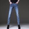 Autumn new high-end elastic black men's jeans trendy brand slim-fitting small feet casual versatile and thin pants men