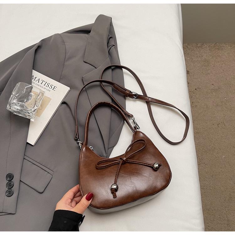 

Французская нишевая сумка-бант: Женская однотонная сумка кроссбоди и на плечо коричневый