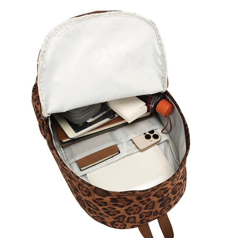 Schoolbag Wholesale Korean Version Versatile Leopard Print Backpack Girl Leisure Backpack Travel Bag Junior High School High School Student Schoolbag