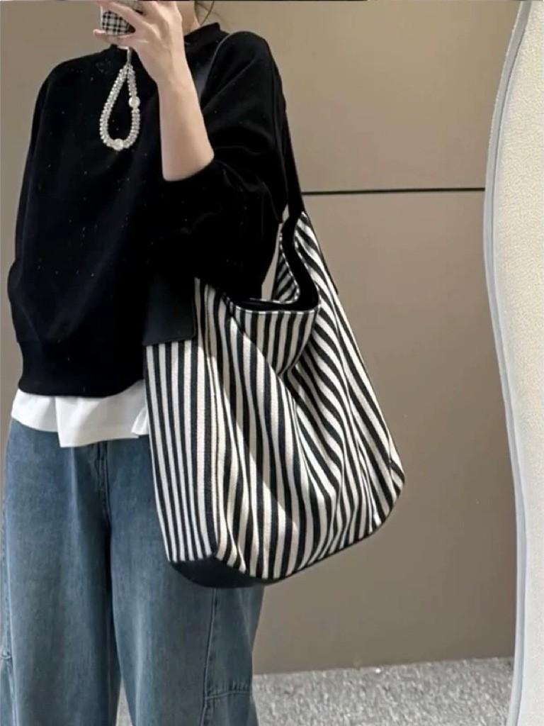 Large capacity tote bag women s 2026 new versatile canvas striped commuter shoulder bag women s casual armpit bag