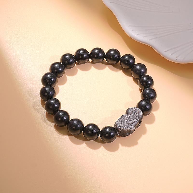 

Подлинный браслет из серебряного обсидиана и эбенового дерева Пи Сю: Символ Мира и Удачи, Идеальный как Значимый Подарок для Пар, с Нишевым Высококлассным Ощущением.