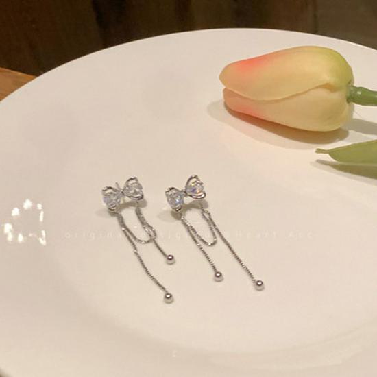 

Элегантные серьги-кисточки с бантом для женщин — роскошный нишевый дизайн, милые и изысканные украшения. Zirconia Bow Tassel