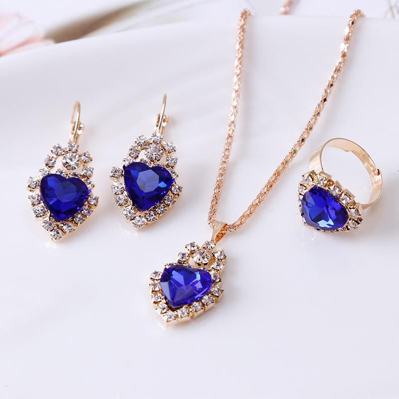 Versatile Set di Gioielli in Tre Pezzi: Collana e Orecchini Multicolor con Design a Goccia d'Acqua di Cristallo con Diamanti.