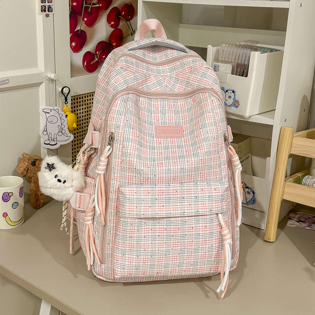 Schoolbag Korean version retro plaid backpack large capacity spine protection to reduce the burden on primary school students, junior high school