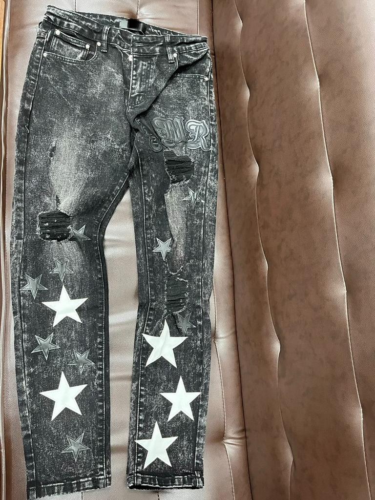 Pantalones vaqueros de moda para jóvenes de Denim Street, con agujeros bordados y elásticos, de pierna pequeña, para hombre