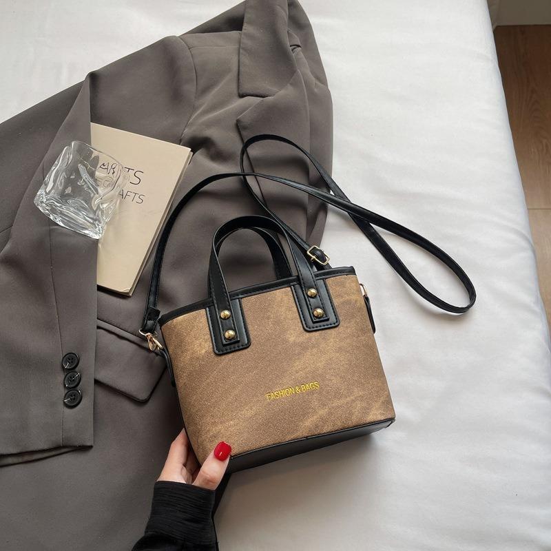 High-end Light Luxury Small Bag Women's New Versatile Messenger Bag Niche Unpopular Portable Bucket Bag Women