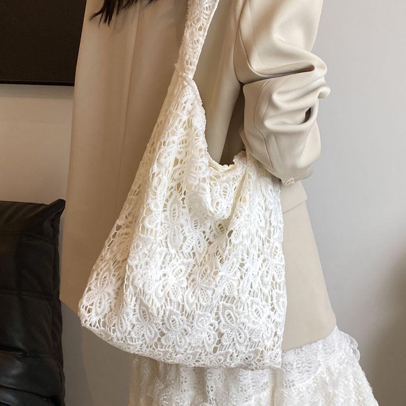 Large Capacity Bag Women's Summer Armpit Canvas Bag High-end Texture Niche Hollow Shoulder Bag