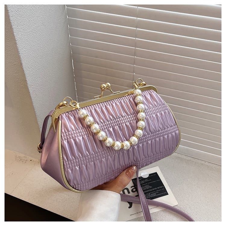 

Folded mouth gold bag women s light luxury pearl handbag лавандовий