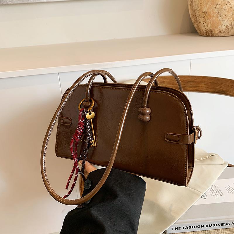 

Сумка через плечо из искусственной кожи в стиле ретро, современный стиль, высокая вместимость, темперамент, универсальная, на одно плечо, модная, осень