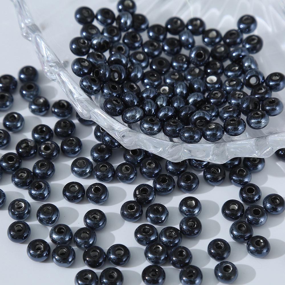 

Черные 3D керамические мультяшные бусины для самодельных украшений ручной работы Wheel spacer (5×7mm)