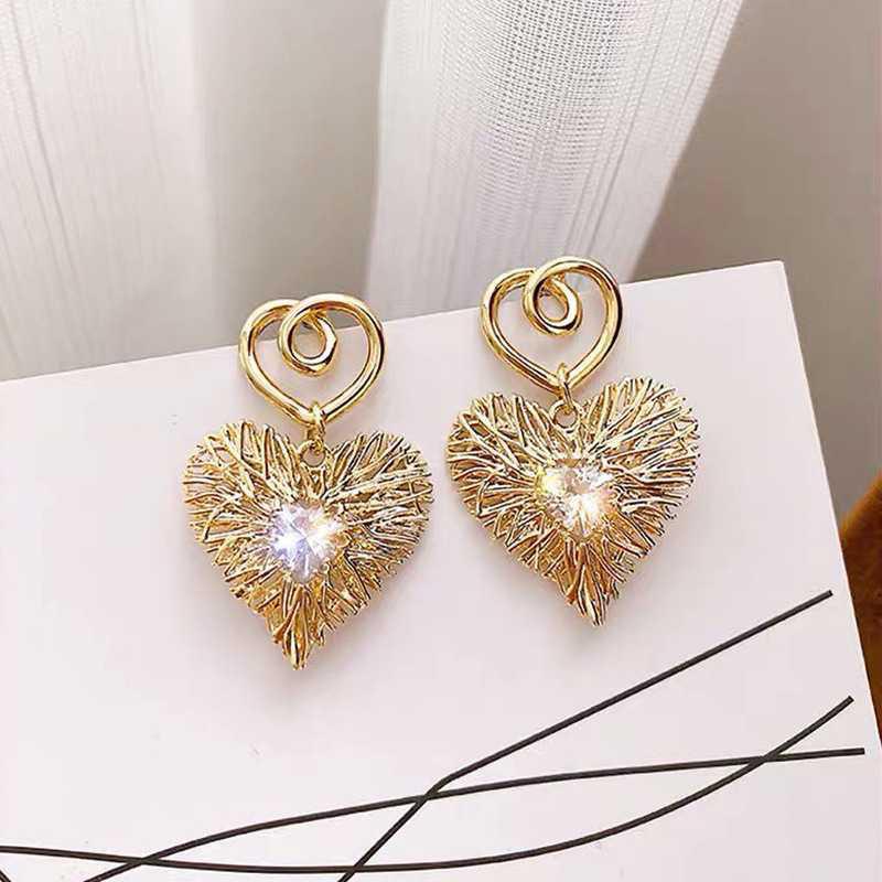 Temperament simple pearl love stud earrings women's light luxury niche design sense high sense Korean versatile earrings ear jewelry
