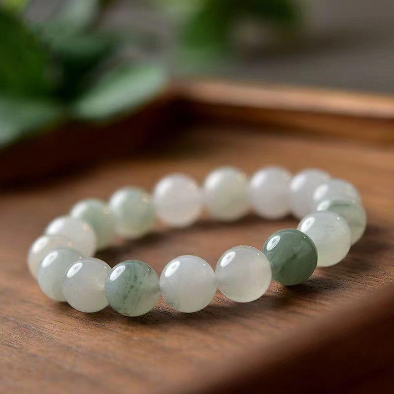 Women's Natural Tianshan Green Jade Bracelet with Round Beads and Floating Flower Design