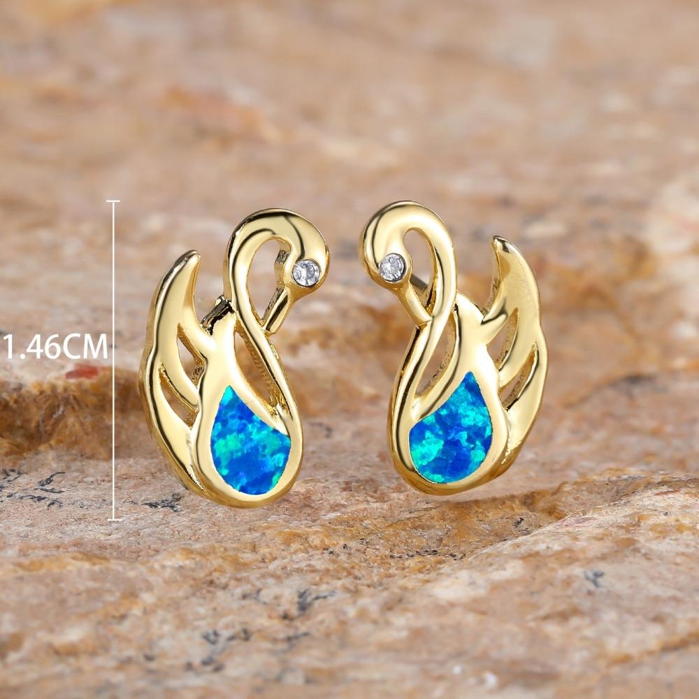 Модные серьги-лебеди с кристаллами циркона — фото 3