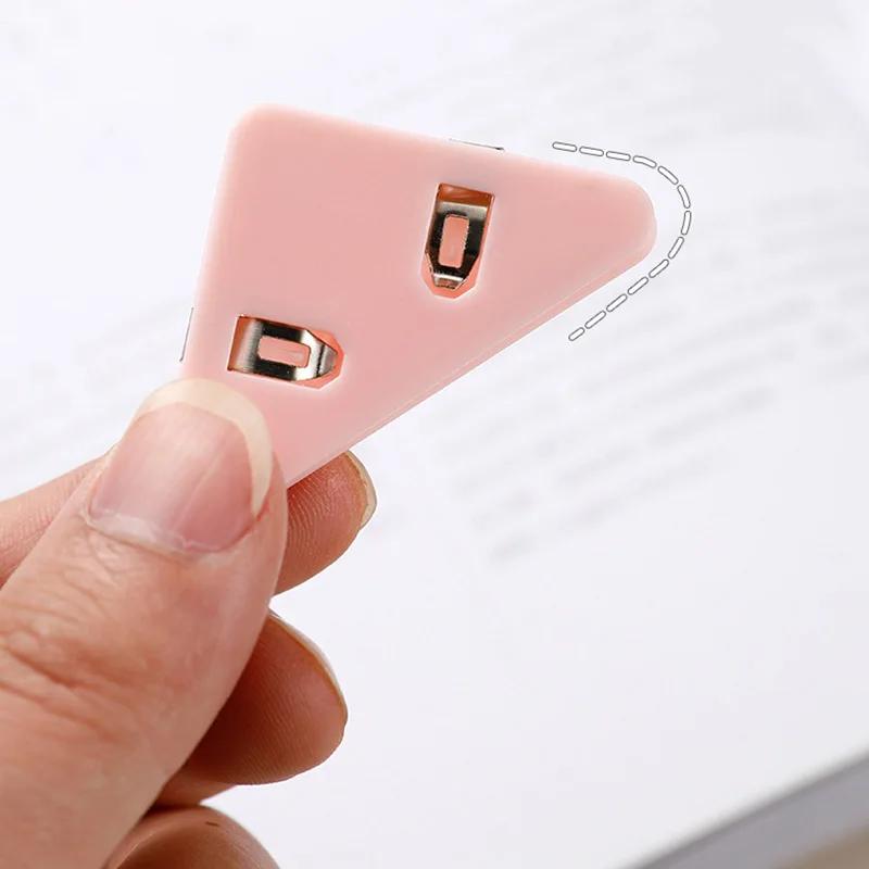 20 vnt. Kūrybingi trikampiai segtukai Sąskaitų segtukas Knygos popieriaus kampų segtukas Stalo laikymo lentynai Biuro raštinės reikmenys Stalinis organizatorius