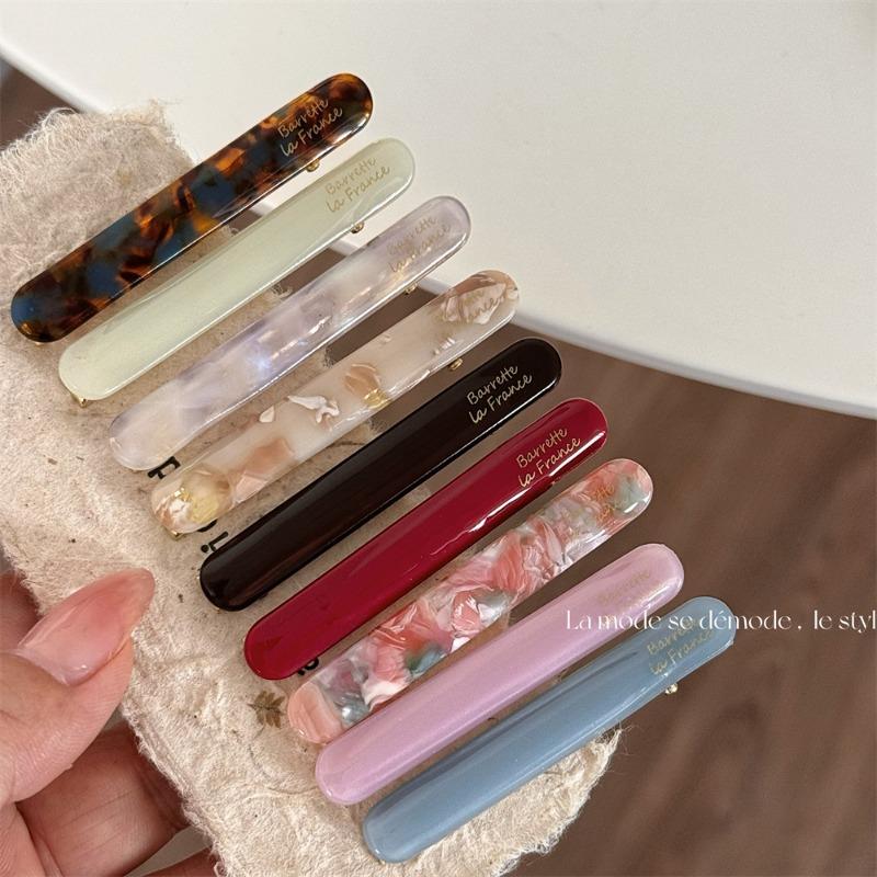 Korean version of the gold label cute little baguette one-word clip French acetic acid texture solid side bangs clip