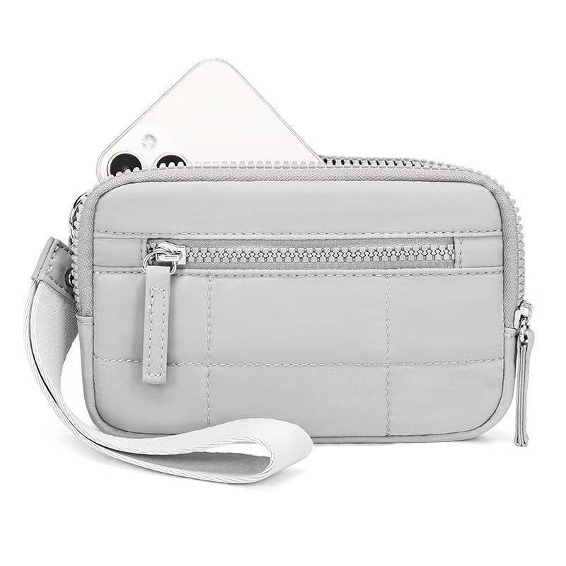 Durable Wristband Phone Bag Waterproof Design with Multi-pocket Features for Outdoor Enthusiasts