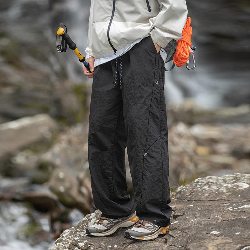 Outdoor tooling casual pants men's new anti-splashing split design long pants four-in-one buckle adjustment charging pants