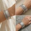 Bohemian Style Metal Bracelet Set with Water Ripple Design - Stackable, Exaggerated Heavy Industry Aesthetic.