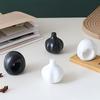 1 Set of Stylish Ceramic Garlic Salt Pepper Shakers , Leakproof, Modern Kitchen Spice Containers with Elegant Black and White Design