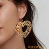 A Pair of Retro Personality Fashionable Copper Hollow Tree Double Love Earrings Are Suitable for Daily Leisure Travel and Versatile