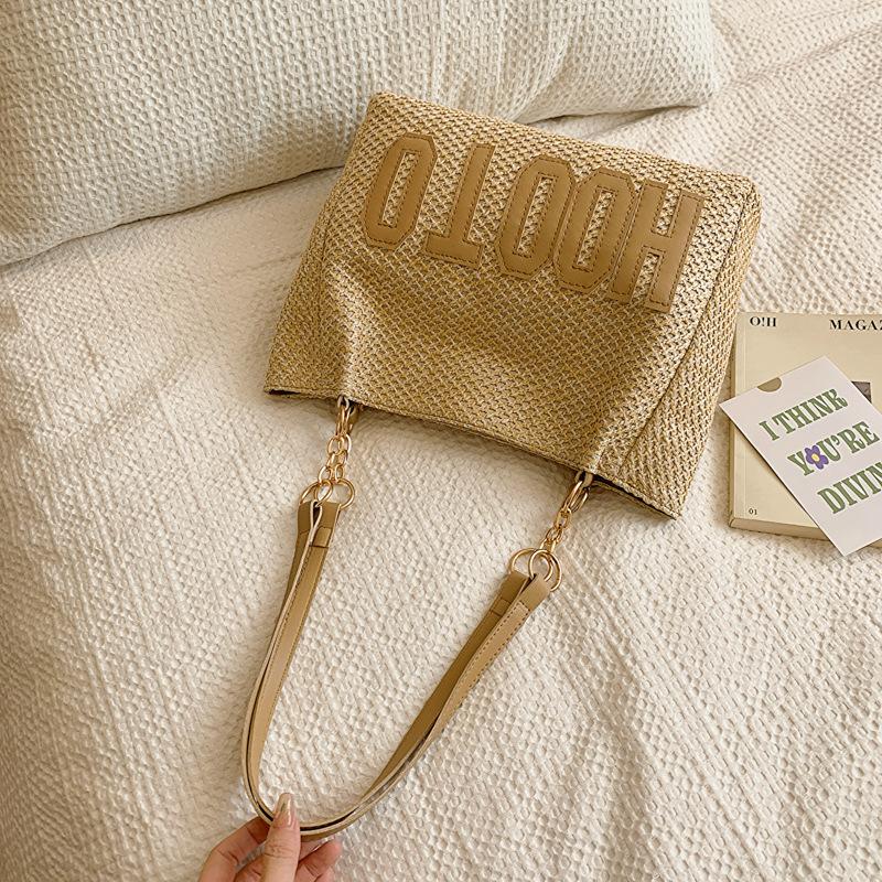 

Вместительная сумка интернет-знаменитости женская 2025 новая трендовая плетеная на плечо женская сумка контрастного цвета модная соломенная сумка-тоут для работы