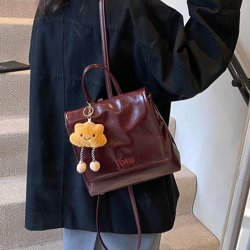 Autumn and winter retro premium women's backpack 2025 new versatile backpack college style small schoolbag