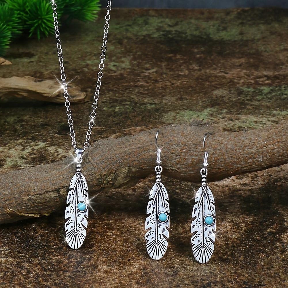 A retro ethnic-style ladies' earring and necklace set, featuring antique silver-colored leaves set in alloy and adorned with turquoise accents,