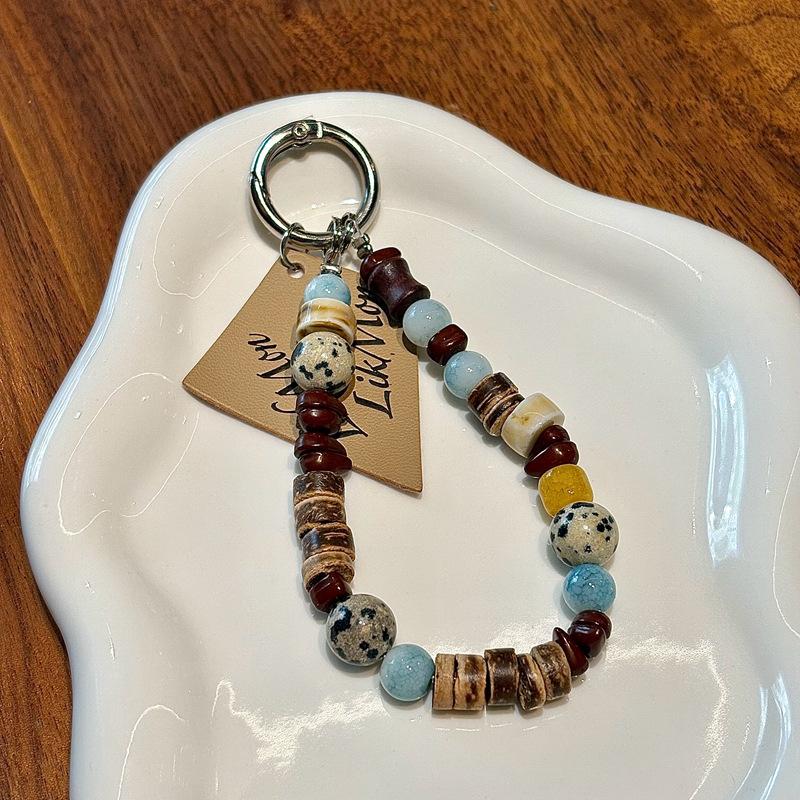 

INS Retro Style Artistic Niche Beaded Phone Chain Bag Pendant Keychain Phone Case Strap High-End Feel Vintage Beaded Leather Pe