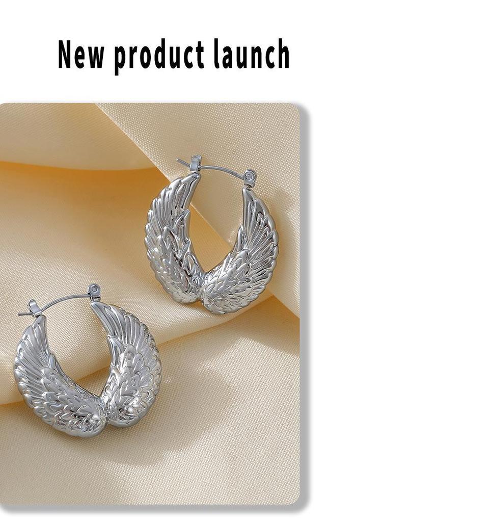 Geometrische Flügel-Ohrringe mit 18 Karat Vergoldung aus Titanstahl - Europäisch/Amerikanisches Retro-Design