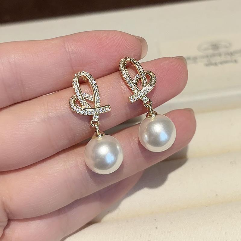 

Серьги-подвески с жемчугом, французский элегантный дизайн, серьги-пусеты, модные темпераментные серьги с высоким чувством стиля, женские